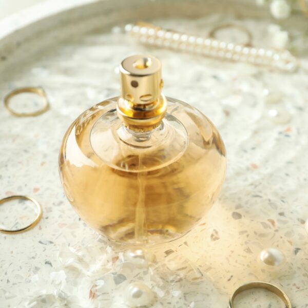 Concept of female perfume, close up and selective focus