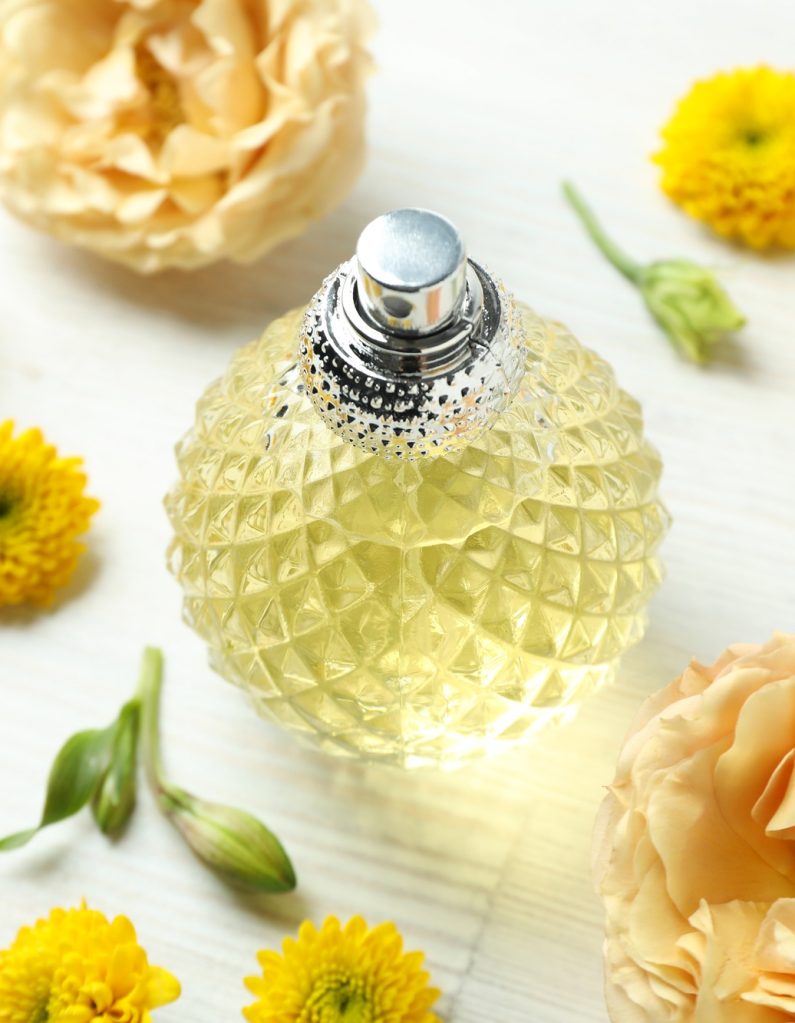 Concept of fragrant flavored perfume, close up